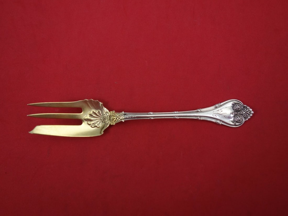 Whiting Empire Sterling Silver Gold Washed Pastry Fork 5 7/8": Whiting Empire Sterling Silver Gold Washed Pastry Fork 5 7/8" This exquisite pastry fork from the Empire pattern by Whiting is crafted from sterling silver and features a beautiful gold wash. Measurin