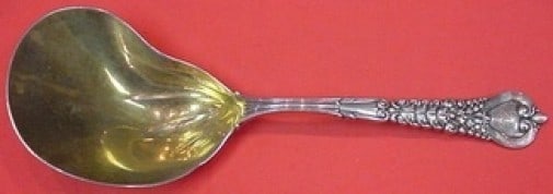 Tiffany & Co. Florentine Sterling Silver Berry Spoon Gold Washed 9 1/2": Tiffany & Co. Florentine Sterling Silver Berry Spoon Gold Washed 9 1/2" This exquisite Florentine pattern berry spoon from Tiffany & Co. is crafted from high-quality sterling silver and features a gol