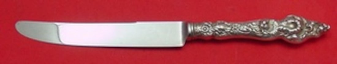 Reed and Barton Les Six Fleurs Sterling Silver Dinner Knife 9.5 inches: Reed and Barton Les Six Fleurs Sterling Silver Dinner Knife 9.5 inches Experience elegance with the Les Six Fleurs dinner knife by Reed & Barton, a masterpiece in sterling silver. This exquisite knife