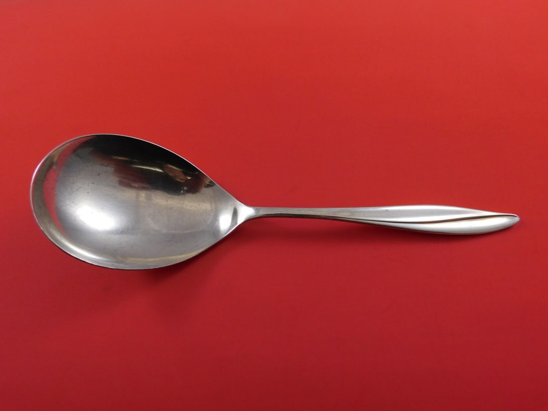 Gorham Firelight Sterling Silver Berry Spoon 9 1/4 Inch Serving: Gorham Firelight Sterling Silver Berry Spoon 9 1/4 Inch Serving This exquisite berry spoon is crafted from sterling silver and features the elegant Firelight pattern by Gorham. Measuring 9 1/4 inches,