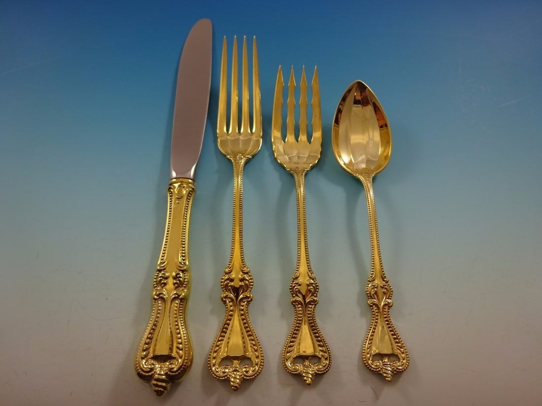 Towle Old Colonial Gold Vermeil Sterling Silver Flatware Set for 8 with Storage Chest: Towle Old Colonial Gold Vermeil Sterling Silver Flatware Set for 8 with Storage Chest Elevate your dining experience with the Old Colonial Gold by Towle Sterling Silver Flatware Set for 8. This exquis