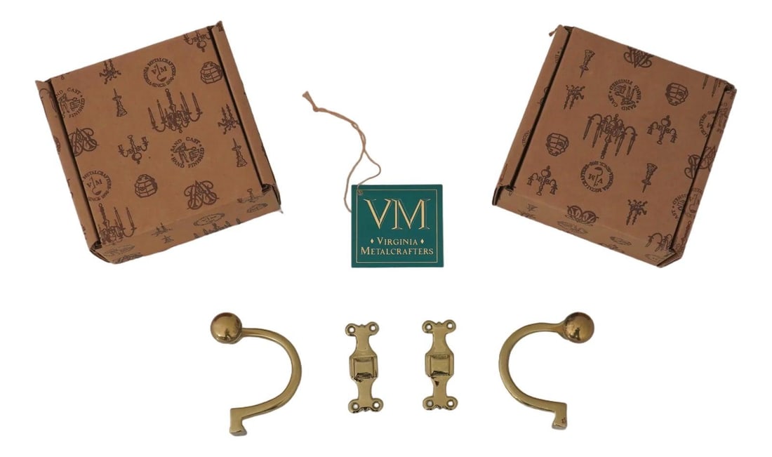 Pair of Solid Brass CW-1605 Jamb Tie Back Hoods with Original Boxes: Pair of Solid Brass CW-1605 Jamb Tie Back Hoods with Original Boxes This pair of Virginia Metalcrafters Colonial Williamsburg jamb tie back hoods from the 1980s features high-quality construction in s