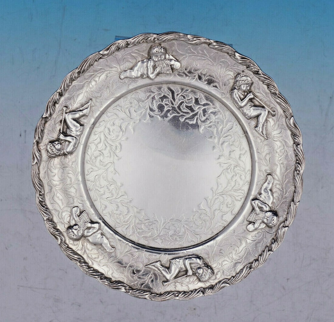 Whiting Art Nouveau Sterling Silver Serving Plate with Cherubs 7.5": Whiting Art Nouveau Sterling Silver Serving Plate with Cherubs 7.5" This exquisite serving plate is a stunning example of Art Nouveau craftsmanship from the Whiting Manufacturing Company, dating back
