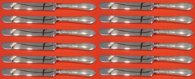 Tiffany & Co Faneuil Sterling Silver Knife Set of 12pc 9 1/4": Tiffany & Co Faneuil Sterling Silver Knife Set of 12pc 9 1/4" Enhance your dining experience with this exquisite set of 12 regular knives in the Faneuil pattern by Tiffany & Co. Crafted from high-qual