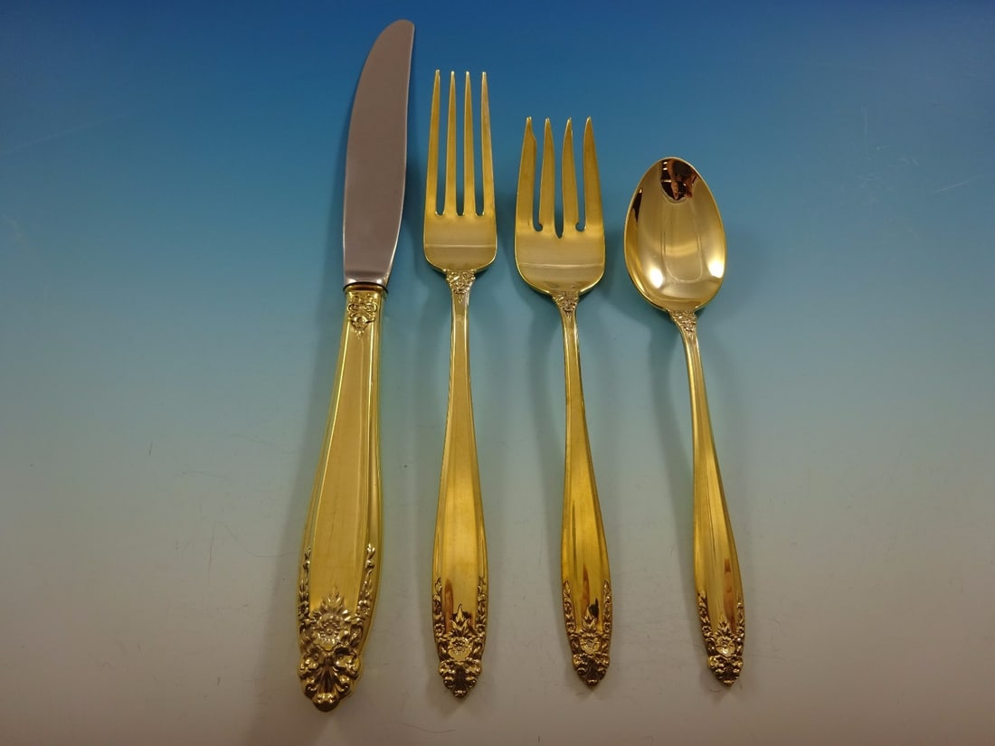 International Silver Prelude Gold Vermeil Flatware Set 48 Pc with Storage Chest: International Silver Prelude Gold Vermeil Flatware Set 48 Pc with Storage Chest Elevate your dining experience with this stunning Prelude Gold Flatware Set by International Sterling. Crafted between 1