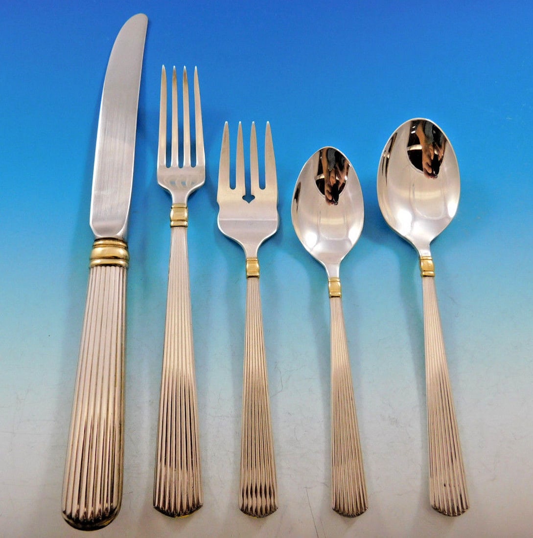 Reed & Barton Ashmont Gold Sterling Silver Flatware Set 45 pcs: Reed & Barton Ashmont Gold Sterling Silver Flatware Set 45 pcs Enhance your dining experience with the Ashmont Gold Sterling Silver Flatware Set by Reed & Barton. This exquisite 45-piece dinnerware se