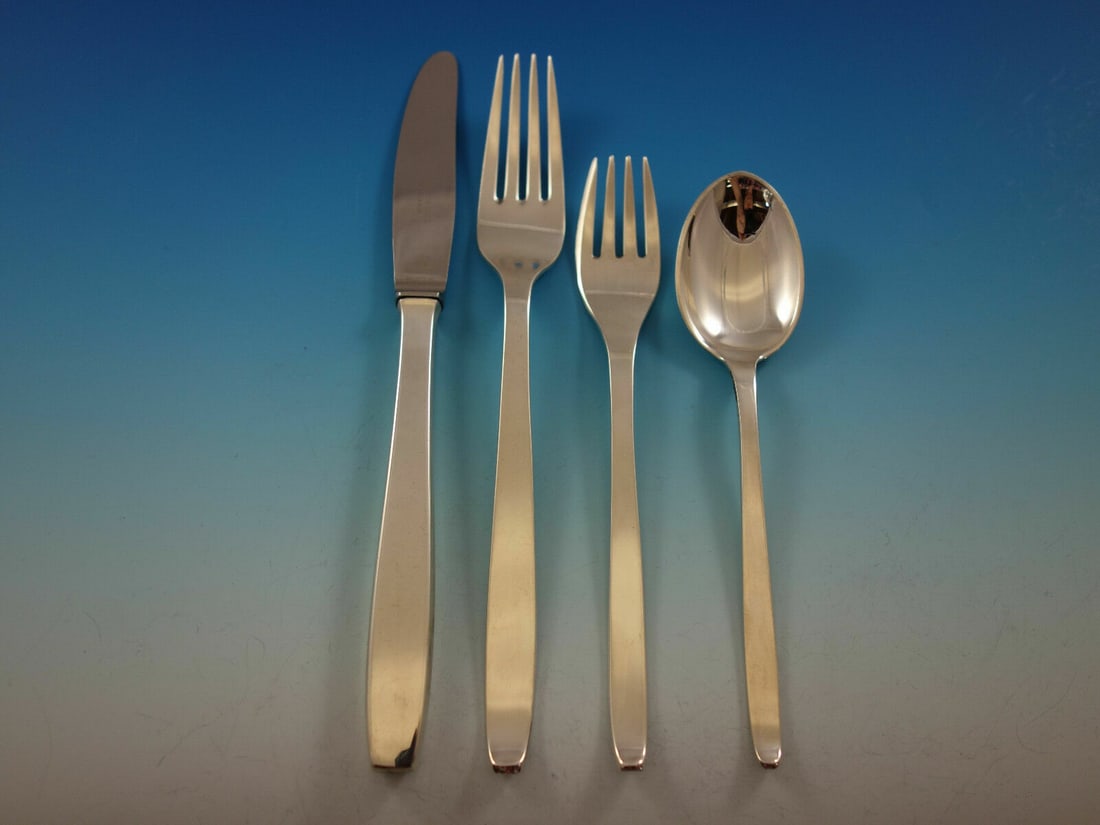 Evald Nielsen Funkis Sterling Silver 4-Pc Dinner Set: Evald Nielsen Funkis Sterling Silver 4-Pc Dinner Set Discover this exquisite 4-piece dinner size place setting from the renowned Evald Nielsen, crafted in sterling silver. This beautiful estate set, k