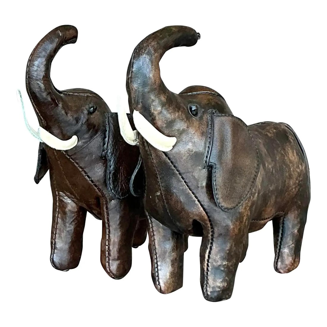Set of 2 Vintage Leather Elephants After Omersa Boho Decor: Set of 2 Vintage Leather Elephants After Omersa Boho Decor Add a touch of vintage safari charm and bohemian whimsy to your decor with this delightful set of two diminutive leather elephants, crafted i