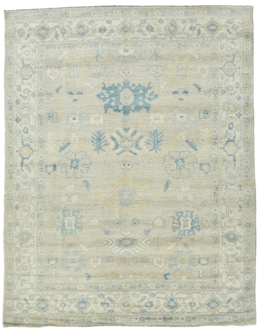 Hand-Knotted Oushak Wool Rug 8'3 x 10' Floral Design Eco-Friendly: Hand-Knotted Oushak Wool Rug 8'3 x 10' Floral Design Eco-Friendly This exquisite hand-knotted Oushak oriental rug features a stunning floral design with muted colors including beige, cream, and blue,