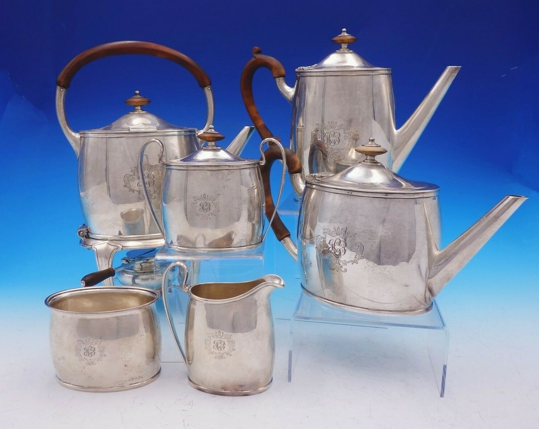 Arthur Stone Pointed End Sterling Silver 6pc Tea Set with Wood Accents: Arthur Stone Pointed End Sterling Silver 6pc Tea Set with Wood Accents This exquisite 6-piece tea set, crafted by Arthur Stone, showcases the Arts and Crafts design with its elegant Pointed End patter