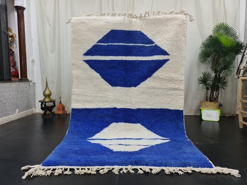 Handmade Moroccan Berber Wool Rug Blue White Design 9.84x6.56: Handmade Moroccan Berber Wool Rug Blue White Design 9.84x6.56 Enhance your space with this Stylish Artistic Soft Handmade Moroccan Berber Wool Rug. Featuring a captivating design in blue and white, th