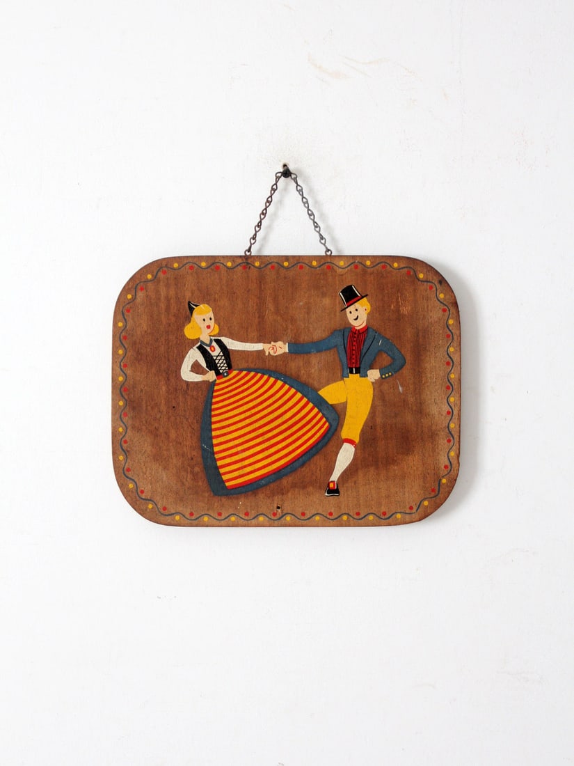 Vintage Hand-Painted Folk Art Wooden Wall Plaque 19 x 12.75: Vintage Hand-Painted Folk Art Wooden Wall Plaque 19 x 12.75 This vintage hand-painted wooden wall plaque features a lively dancing folk couple beautifully illustrated in vibrant colors. The spirited f