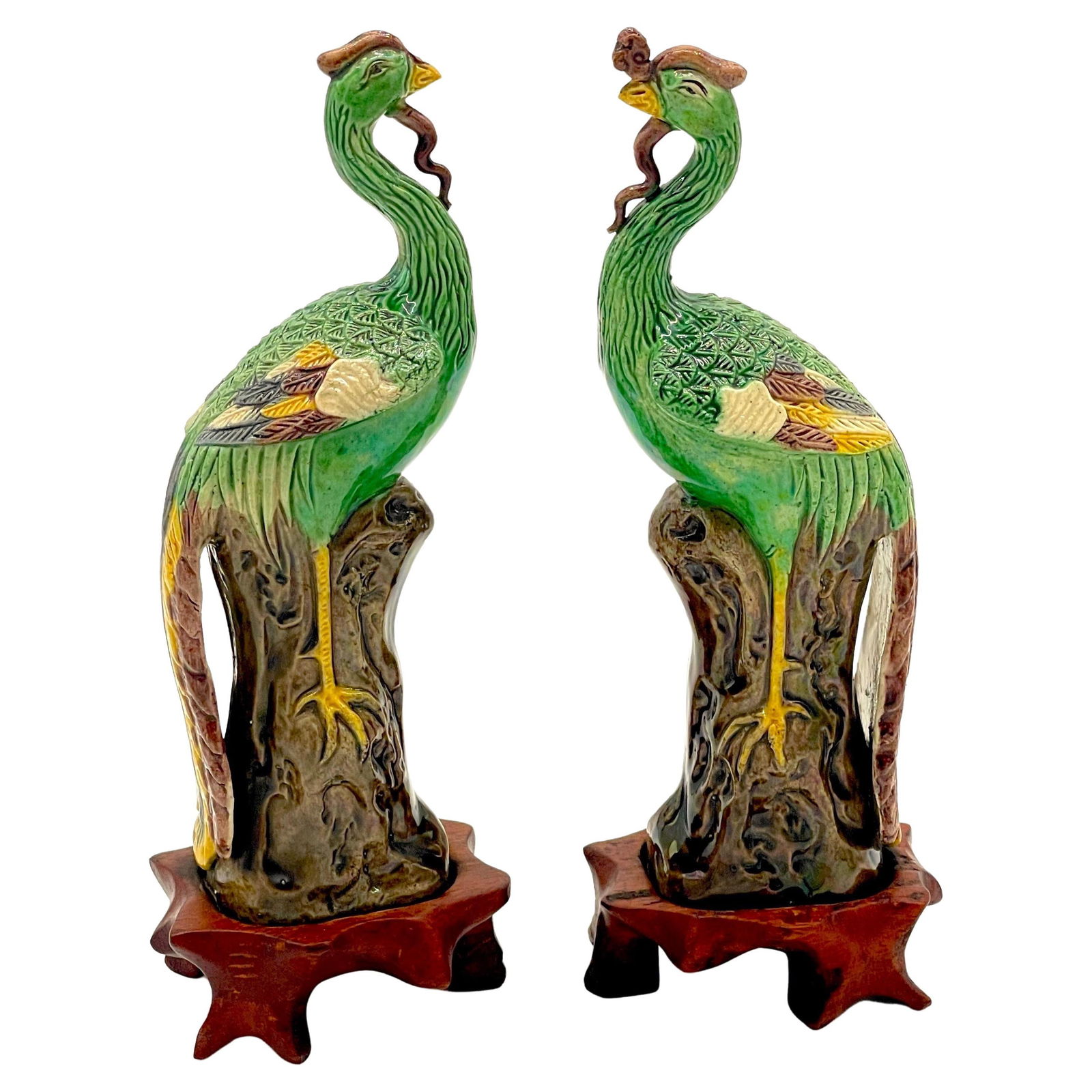 Set of 2 Chinese Sancai Glazed Phoenix Birds on Hardwood Stands: Set of 2 Chinese Sancai Glazed Phoenix Birds on Hardwood Stands This exquisite pair of diminutive Chinese Sancai glazed phoenix birds is beautifully displayed on intricately carved hardwood stands. Th