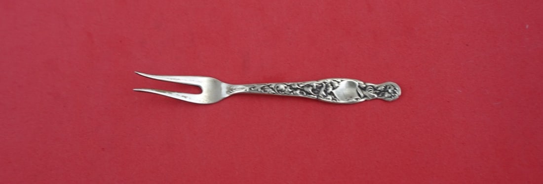 Whiting Heraldic Sterling Silver 2-Tine Lemon Fork 4 Inch: Whiting Heraldic Sterling Silver 2-Tine Lemon Fork 4 Inch This Heraldic by Whiting serving fork is a beautiful addition to any table setting. Crafted from high-quality sterling silver, this 2-tine lem