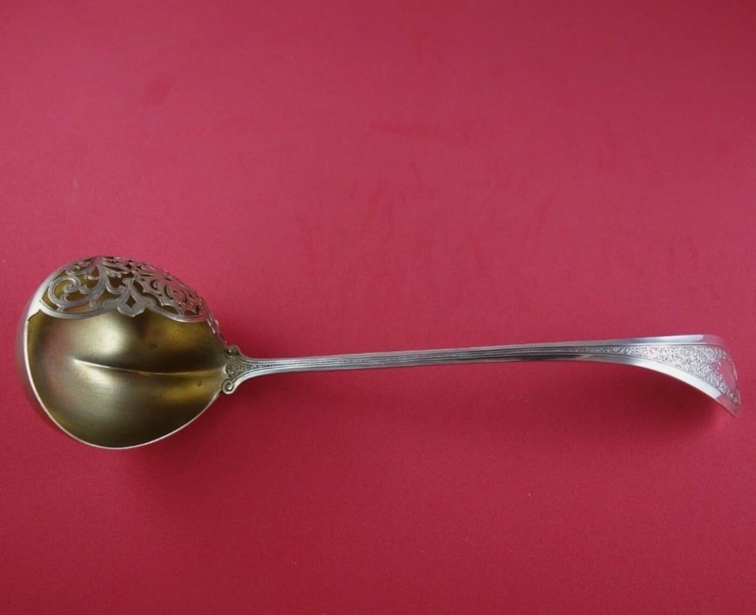 Wendt Florentine Sterling Silver Oyster Ladle Gold Washed 11 3/8": Wendt Florentine Sterling Silver Oyster Ladle Gold Washed 11 3/8" This exquisite oyster ladle from the Florentine pattern by Wendt is crafted from sterling silver and features a gold wash finish. With
