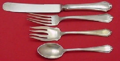 International Sterling Silver Shirley 4-Piece Place Setting: International Sterling Silver Shirley 4-Piece Place Setting This exquisite 4-piece place setting features the Shirley pattern by International Sterling, crafted from high-quality sterling silver. The