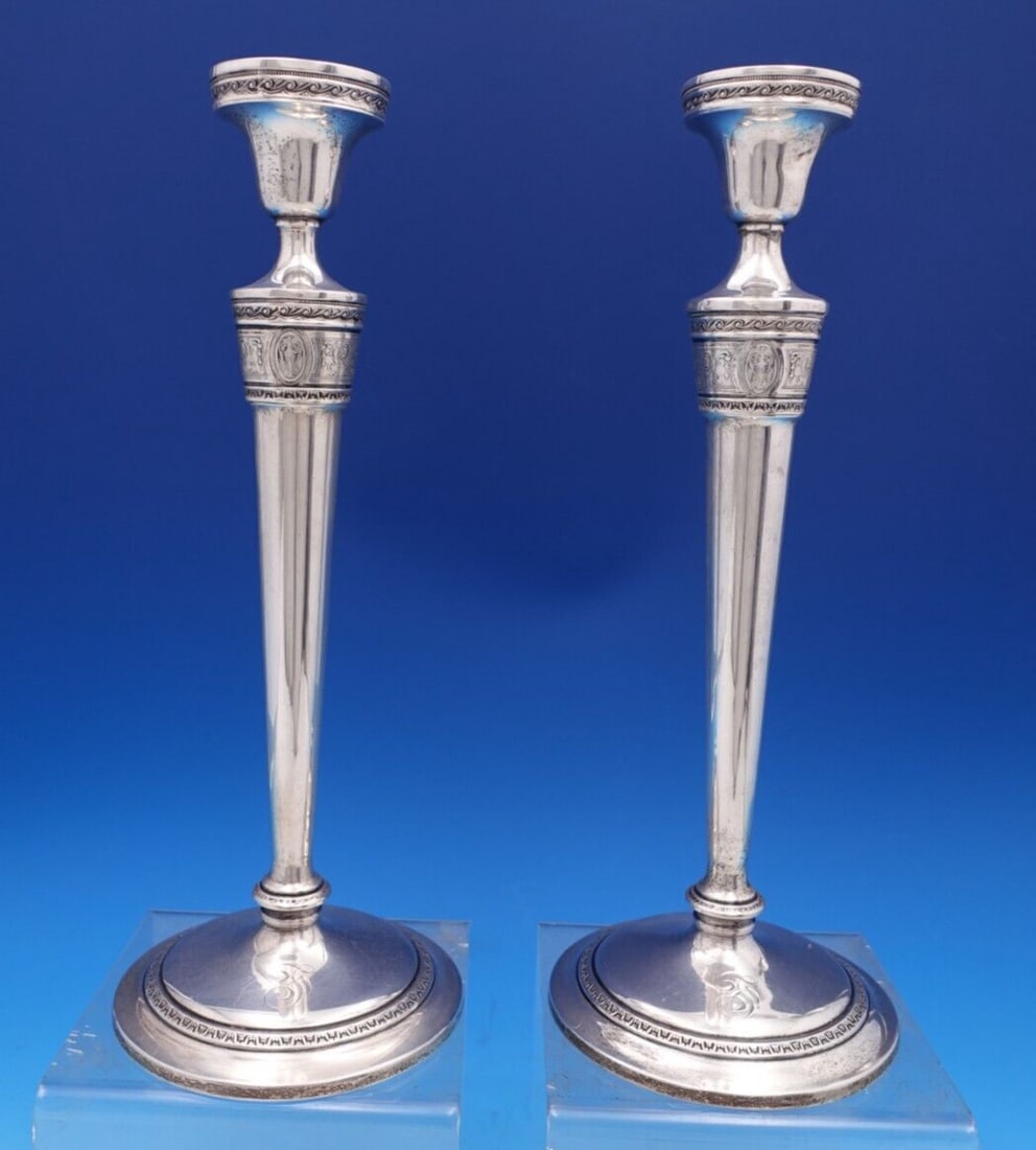 Elegant Wedgwood Sterling Silver Candlestick Pair by International 12": Elegant Wedgwood Sterling Silver Candlestick Pair by International 12" This exquisite pair of candlesticks showcases the timeless elegance of the Wedgwood pattern by International Sterling. Crafted fr