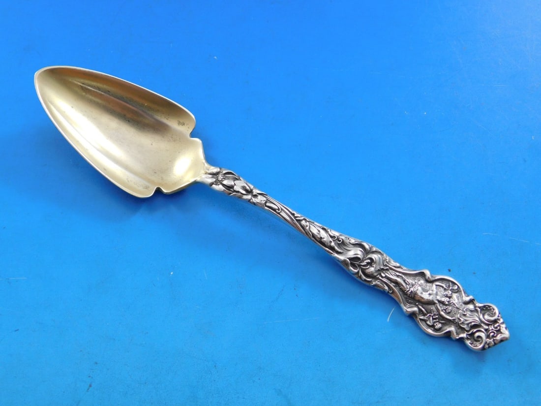 Wallace Irian Sterling Silver Gold Washed Grapefruit Spoon 6" Art Nouveau: Wallace Irian Sterling Silver Gold Washed Grapefruit Spoon 6" Art Nouveau Experience the elegance of the Irian grapefruit spoon from Wallace, crafted from sterling silver and beautifully gold washed.