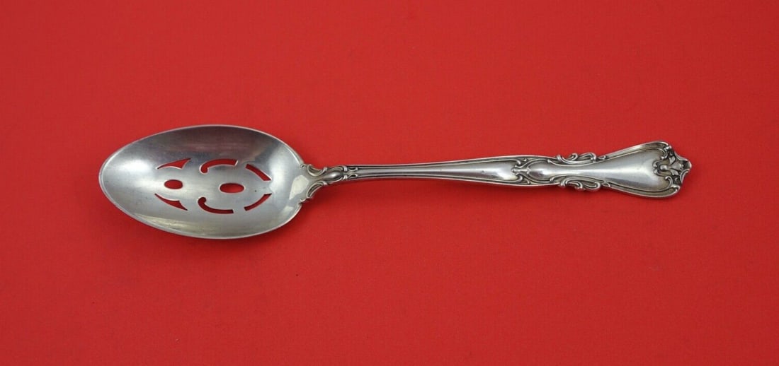 Watson Victoria New Sterling Silver Pierced Serving Spoon 8.5": Watson Victoria New Sterling Silver Pierced Serving Spoon 8.5" This exquisite serving spoon features the elegant Victoria New pattern by Watson. Crafted from high-quality sterling silver, it measures