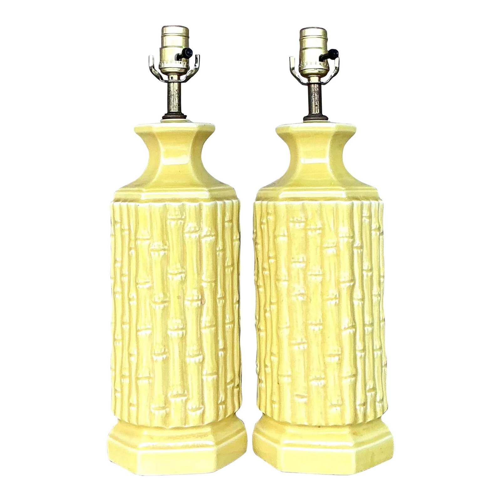 Pair of Vintage Yellow Glazed Ceramic Bamboo Lamps: Pair of Vintage Yellow Glazed Ceramic Bamboo Lamps Brighten your home with this elegant pair of vintage coastal glazed ceramic bamboo lamps. Each lamp features a vibrant yellow glaze with a textured b