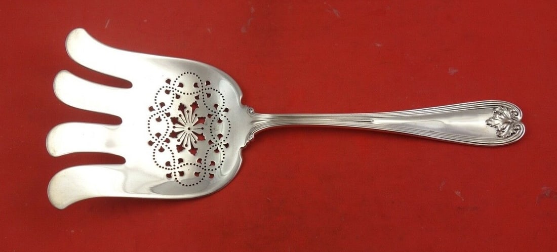 Tiffany & Co Colonial Sterling Silver Asparagus Fork 9.5 Inch: Tiffany & Co Colonial Sterling Silver Asparagus Fork 9.5 Inch This exquisite asparagus fork is a stunning example of the Colonial pattern by Tiffany & Co., crafted from high-quality sterling silver. M