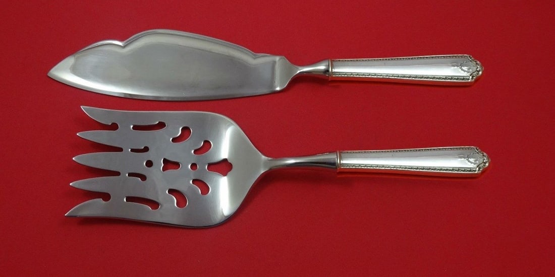 Westmorland Lady Hilton Sterling Silver Fish Serving Set 2 Piece: Westmorland Lady Hilton Sterling Silver Fish Serving Set 2 Piece Enhance your dining experience with the Lady Hilton Fish Serving Set by Westmorland. This exquisite 2-piece set is crafted from sterlin