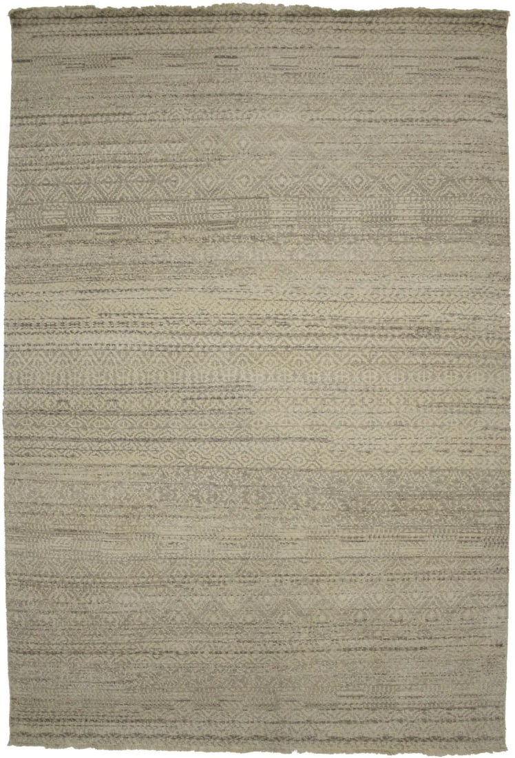 6x9 ft Hand-Knotted Wool Transitional Floral Area Rug in Beige Tones: 6x9 ft Hand-Knotted Wool Transitional Floral Area Rug in Beige Tones This hand-knotted area rug features a transitional floral and geometric design in muted beige, cream, brown, and tan tones. Crafted