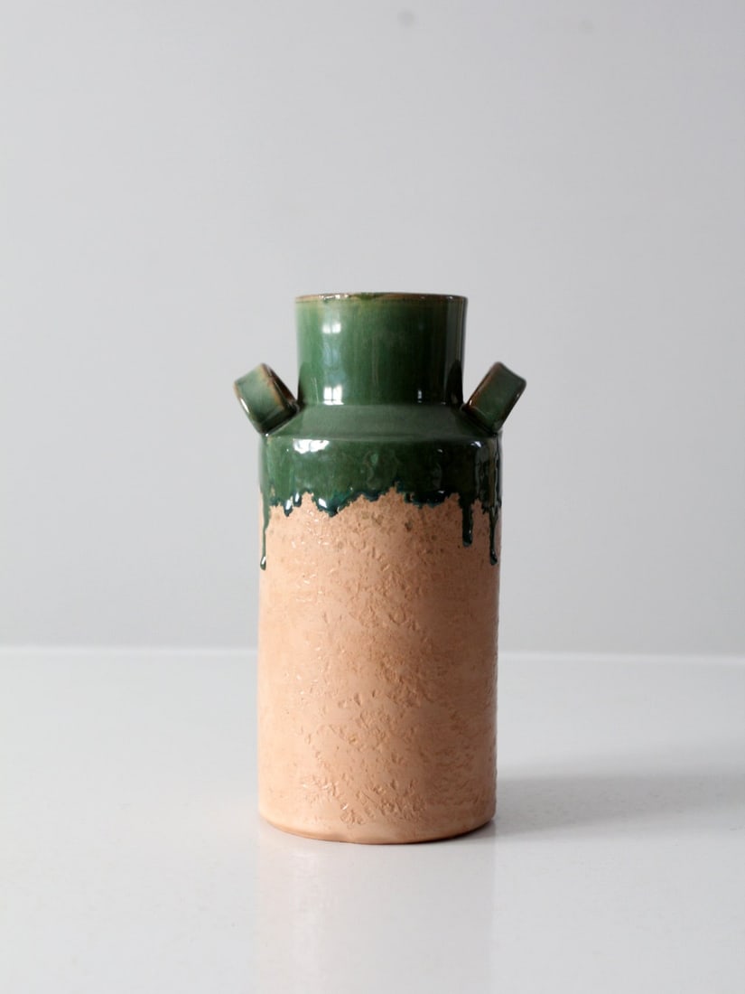 Vintage Italian Terra Cotta Vase with Emerald Green Drip Glaze: Vintage Italian Terra Cotta Vase with Emerald Green Drip Glaze This vintage Italian terra cotta vase showcases a stunning emerald green drip glaze and features a classic double handled design. Perfect