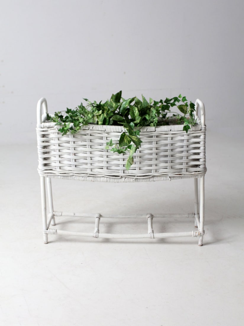 Charming Vintage White Wicker Plant Stand 32 x 11 x 27.75: Charming Vintage White Wicker Plant Stand 32 x 11 x 27.75 Enhance your home decor with this Vintage White Wicker Plant Stand, featuring a classic woven wicker design and a soft white finish that bring