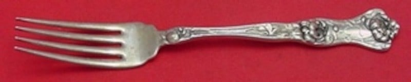 Sterling Silver Fork in Peony Pattern by Wallace 7 1/8 Inch: Sterling Silver Fork in Peony Pattern by Wallace 7 1/8 Inch This is a Wallace Peony pattern regular fork crafted from sterling silver. The fork measures 7 1/8 inches in length and is not monogrammed.