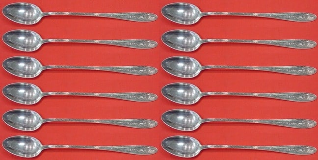 International Sterling Silver Wedgwood 12 Piece Iced Tea Spoon Set: International Sterling Silver Wedgwood 12 Piece Iced Tea Spoon Set This exquisite 12-piece iced tea spoon set features the elegant Wedgwood pattern by International Sterling. Each spoon measures 7 1/2