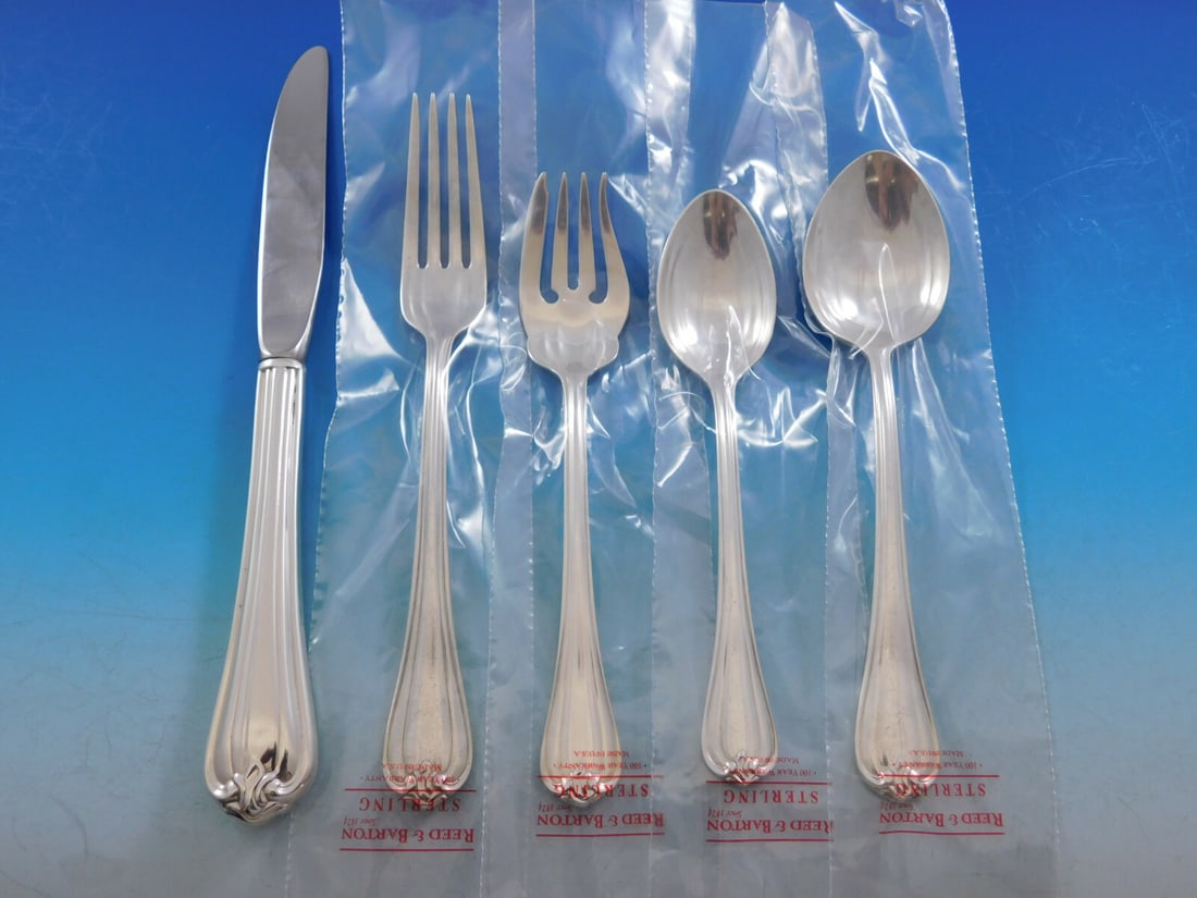 Reed & Barton Woodwind Sterling Silver Flatware Set 44 Pieces for 8: Reed & Barton Woodwind Sterling Silver Flatware Set 44 Pieces for 8 Elevate your dining experience with the exquisite Woodwind Sterling Silver Flatware Set by Reed & Barton. This elegant 44-piece set