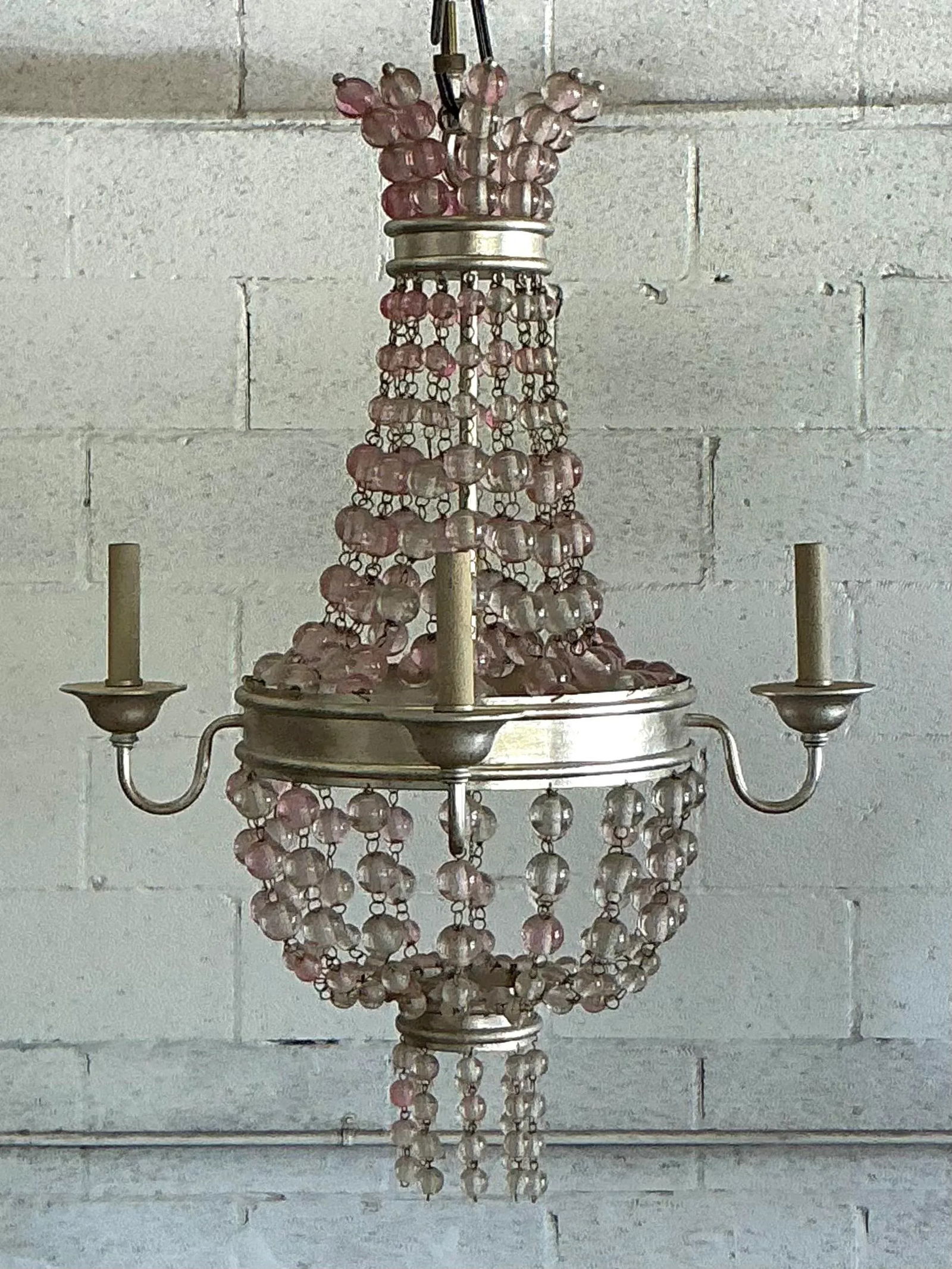 Vintage Bohemian Beaded Chandelier in Pink Glass and Silver Metal: Vintage Bohemian Beaded Chandelier in Pink Glass and Silver Metal Elevate your interior design with this enchanting vintage Boho beaded chandelier. This captivating fixture features cascading transluc
