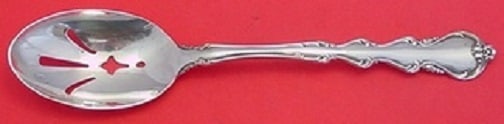 International Sterling Silver Slotted Serving Spoon Angelique 8 3/8 Inch: International Sterling Silver Slotted Serving Spoon Angelique 8 3/8 Inch This exquisite slotted serving spoon is part of the Angelique pattern by International, crafted from high-quality sterling silv