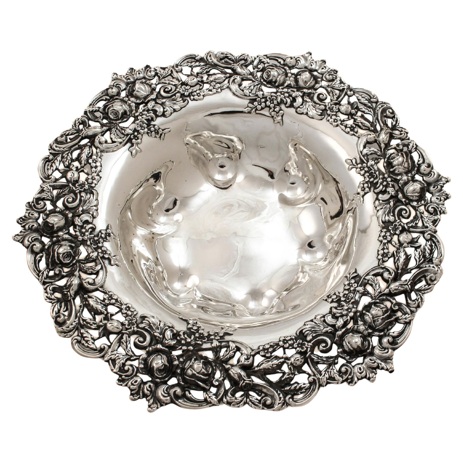 J E Caldwell Art Nouveau 10 Inch Sterling Silver Floral Pierced Rim Bowl: J E Caldwell Art Nouveau 10 Inch Sterling Silver Floral Pierced Rim Bowl This Art Nouveau sterling silver bowl, crafted circa 1910 by J. E. Caldwell & Co. in Philadelphia, exemplifies the refined arti