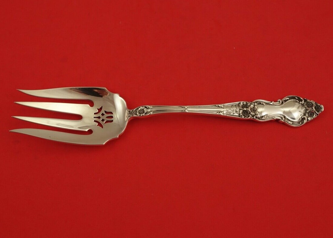 Wallace Meadow Rose Sterling Silver Pierced Cold Meat Fork 8 3/4": Wallace Meadow Rose Sterling Silver Pierced Cold Meat Fork 8 3/4" This exquisite Meadow Rose serving fork by Wallace is crafted from high-quality sterling silver. With a length of 8 3/4 inches, this p
