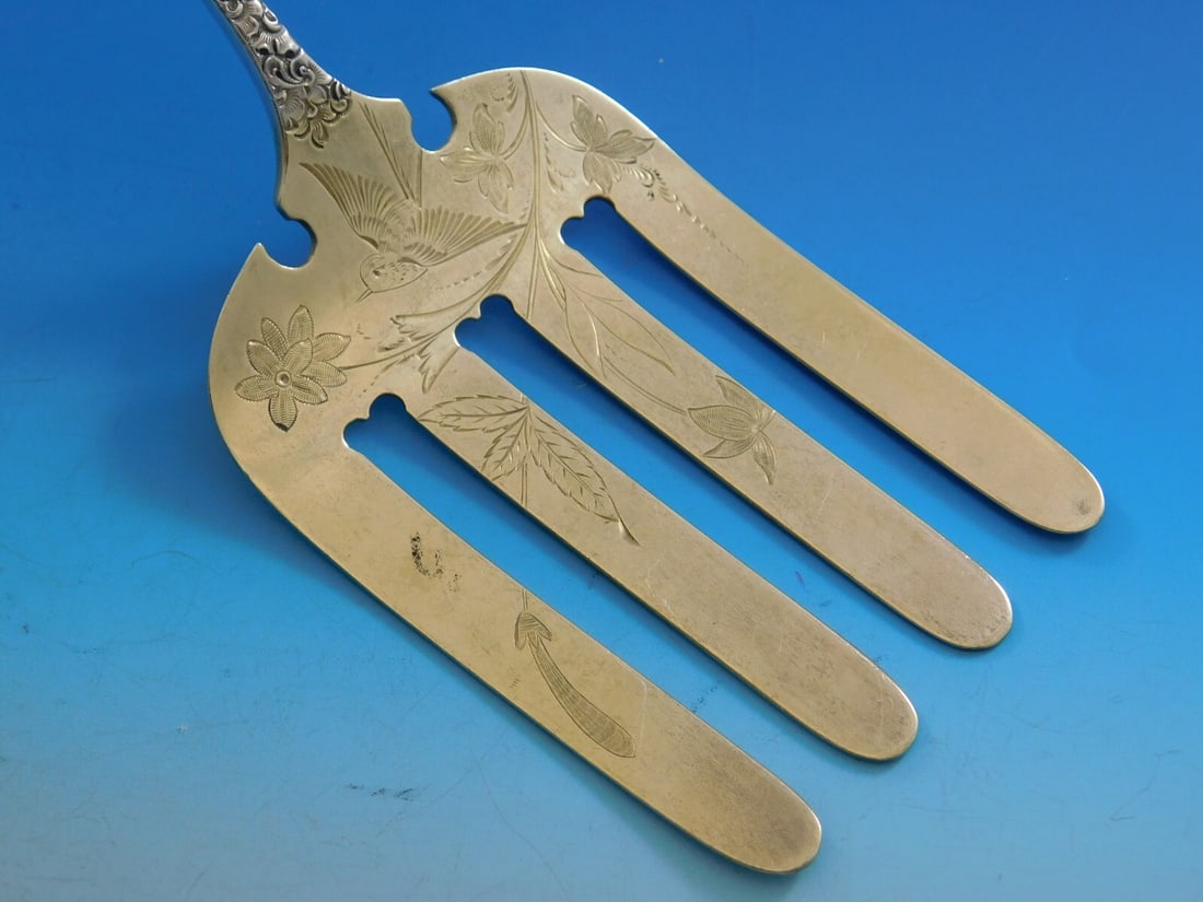 Bailey Banks Biddle 1881 Sterling Silver Brite Cut Asparagus Fork with Bird Engravings: Bailey Banks Biddle 1881 Sterling Silver Brite Cut Asparagus Fork with Bird Engravings This exquisite serving fork is a stunning piece from Bailey Banks & Biddle, crafted in sterling silver and design