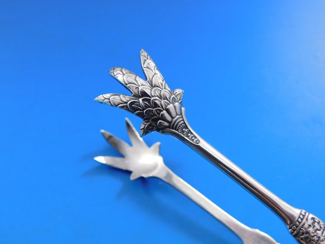 Gorham Fontainebleau Sterling Silver Sugar Tong 5 Inch with Claws: Gorham Fontainebleau Sterling Silver Sugar Tong 5 Inch with Claws Elevate your serving experience with this exquisite Fontainebleau by Gorham Sterling Silver Sugar Tong. Measuring 5 inches in length,