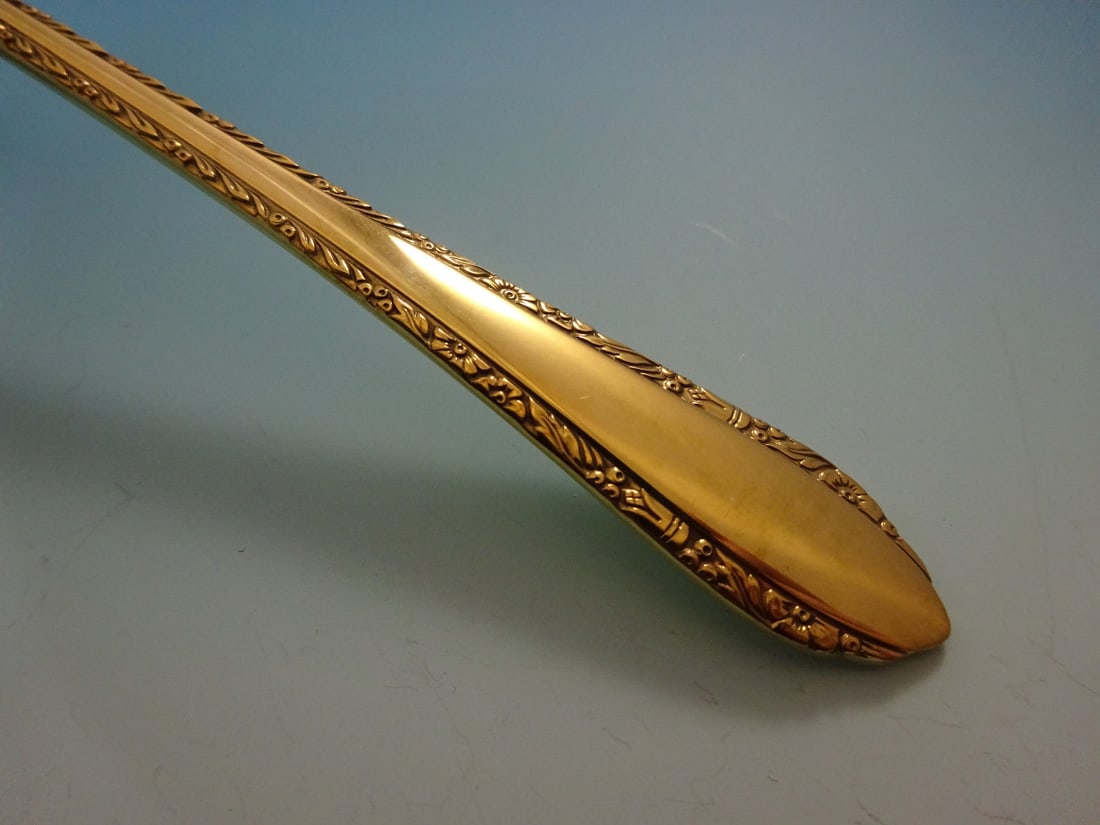 Royal Crest Wild Flower Gold Vermeil Sterling Silver Flatware Set 48 Pieces: Royal Crest Wild Flower Gold Vermeil Sterling Silver Flatware Set 48 Pieces Elevate your dining experience with the Wild Flower Gold flatware set by Royal Crest. This stunning service set, crafted fro