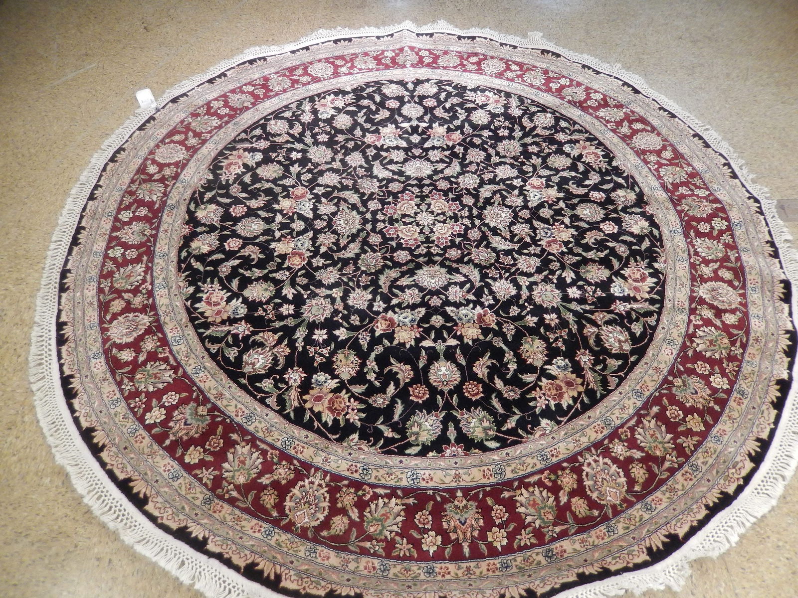 7.11 x 8.3 Round Hand Knotted Wool Silk Rug Fine Weave Black: 7.11 x 8.3 Round Hand Knotted Wool Silk Rug Fine Weave Black Free continental US Shipping This round hand-knotted rug measures 7.11 x 8.3 feet and features a fine weave crafted by skilled artisans. Ma