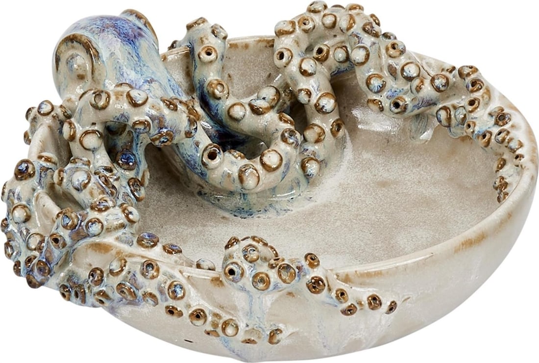 Handmade Ocean-Themed Cream Bowl with Octopus Design: Handmade Ocean-Themed Cream Bowl with Octopus Design Discover this unique ocean-themed bowl, a stunning handmade piece that captures the essence of the sea. Its cream white finish beautifully compleme
