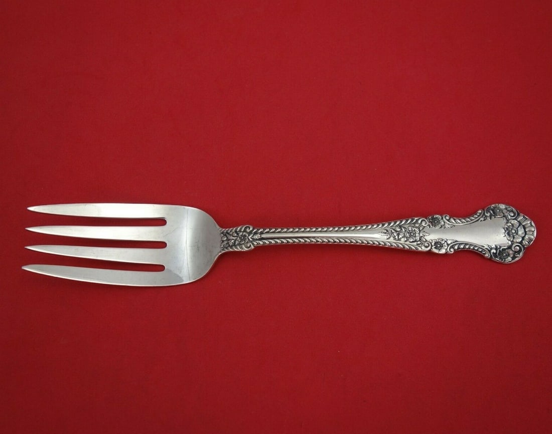 Durgin English Rose Sterling Silver Serving Fork 8.5 inch: Durgin English Rose Sterling Silver Serving Fork 8.5 inch This elegant cold meat fork is a stunning piece in the English Rose pattern by Durgin. Crafted from high-quality sterling silver, this large s