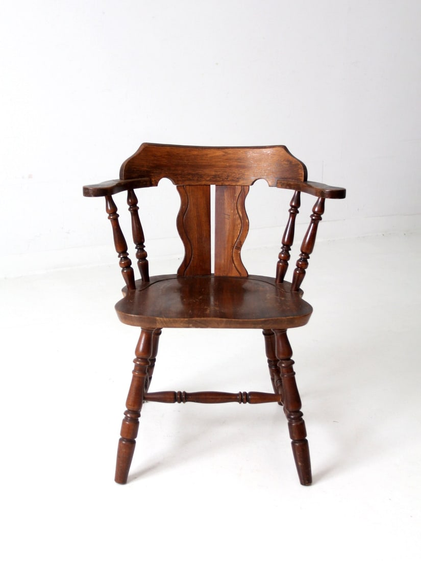 1970s Vintage Wood Tavern Armchair with Double Splat Back: 1970s Vintage Wood Tavern Armchair with Double Splat Back This vintage 1970s tavern armchair is a charming addition to any dining space. Crafted from wood, it features a classic captain's design with