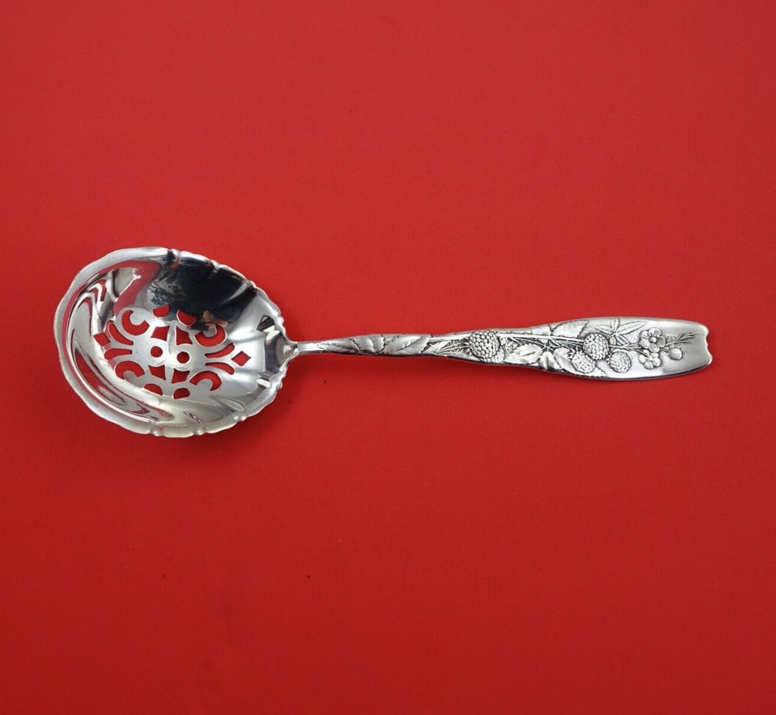 Whiting Berry Sterling Silver Raspberry Motif Serving Spoon 8 3/4": Whiting Berry Sterling Silver Raspberry Motif Serving Spoon 8 3/4" This exquisite serving spoon features the Berry pattern by Whiting, crafted from sterling silver. Measuring 8 3/4 inches, it showcase