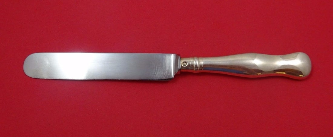 Austrian .800 Silver Knife Blunt Flatware Circa 1867-1872: Austrian .800 Silver Knife Blunt Flatware Circa 1867-1872 This exquisite Austrian Sterling knife, crafted from .800 silver, dates back to circa 1867-1872. With a hollow handle and a blunt blade, this