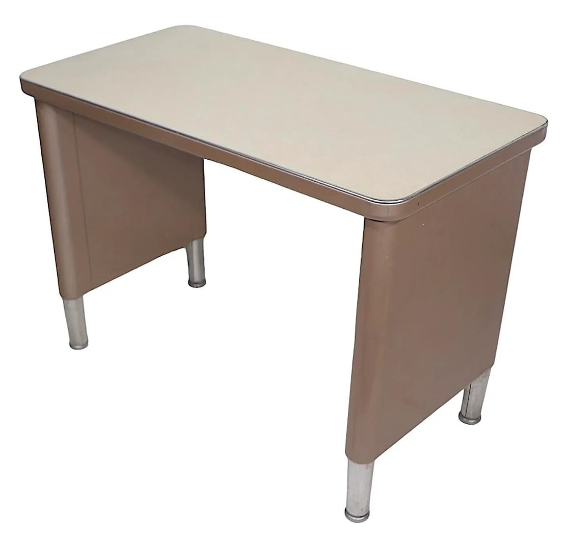 Vintage McDowell and Craig Industrial Writing Desk 1960s Chrome Steel: Vintage McDowell and Craig Industrial Writing Desk 1960s Chrome Steel This vintage tanker style writing desk from McDowell and Craig embodies the industrial design aesthetic of the 1960s. Ideal for us
