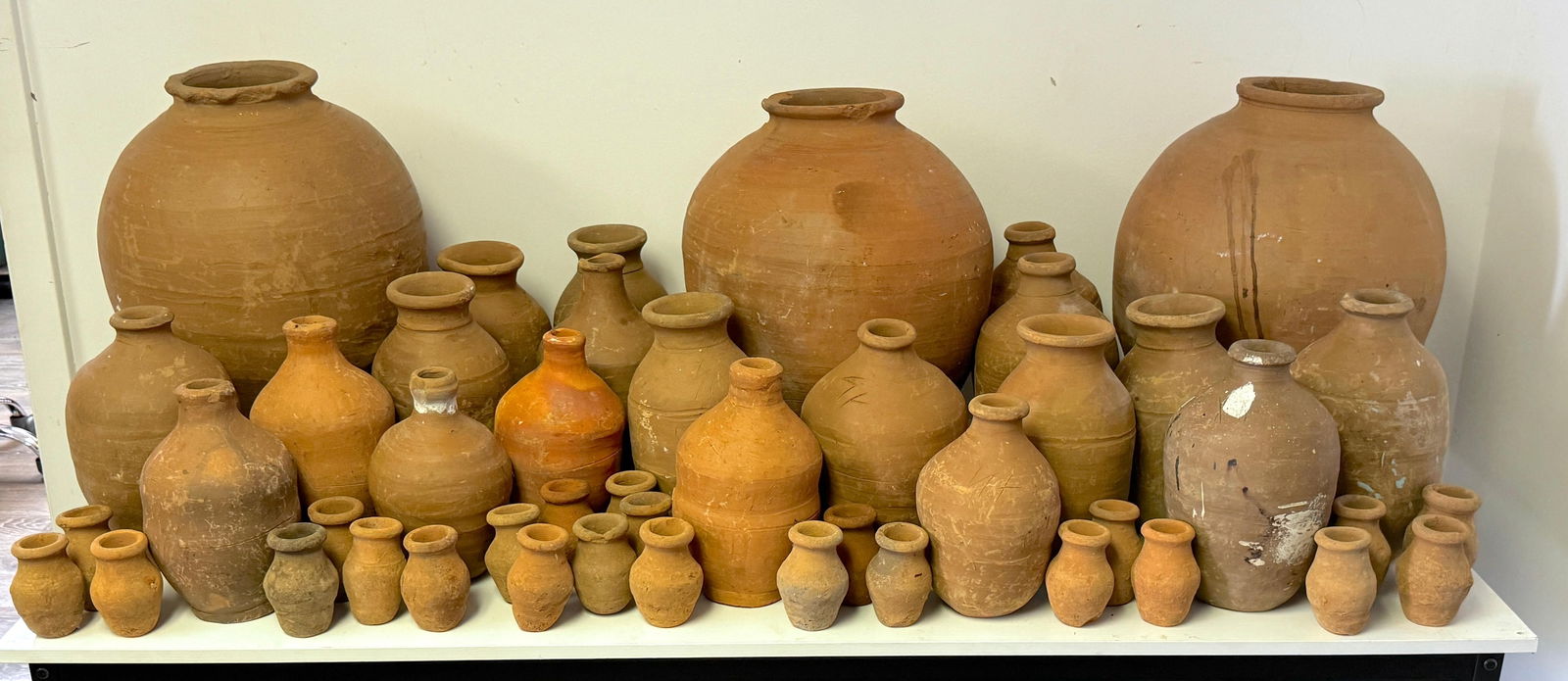 46 Piece Spanish Colonial Terracotta Vases Collection Rustic Set: 46 Piece Spanish Colonial Terracotta Vases Collection Rustic Set This remarkable collection features 46 Spanish Colonial-style hand-thrown terracotta vessels, dating from the late 19th to early 20th c