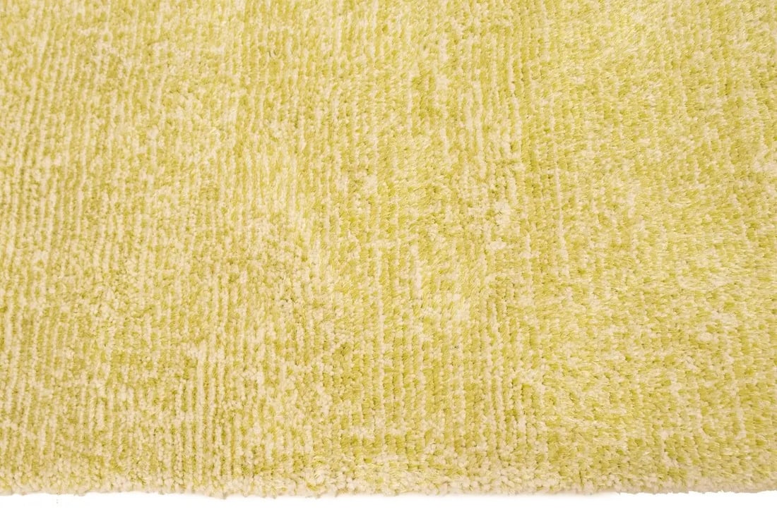 Modern 5x8 Citron Polyester Area Rug for Office or Kids Room: Modern 5x8 Citron Polyester Area Rug for Office or Kids Room This pre-owned modern area rug features a solid citron color, adding a vibrant touch to any space. Crafted in Europe, the rug is machine-ma