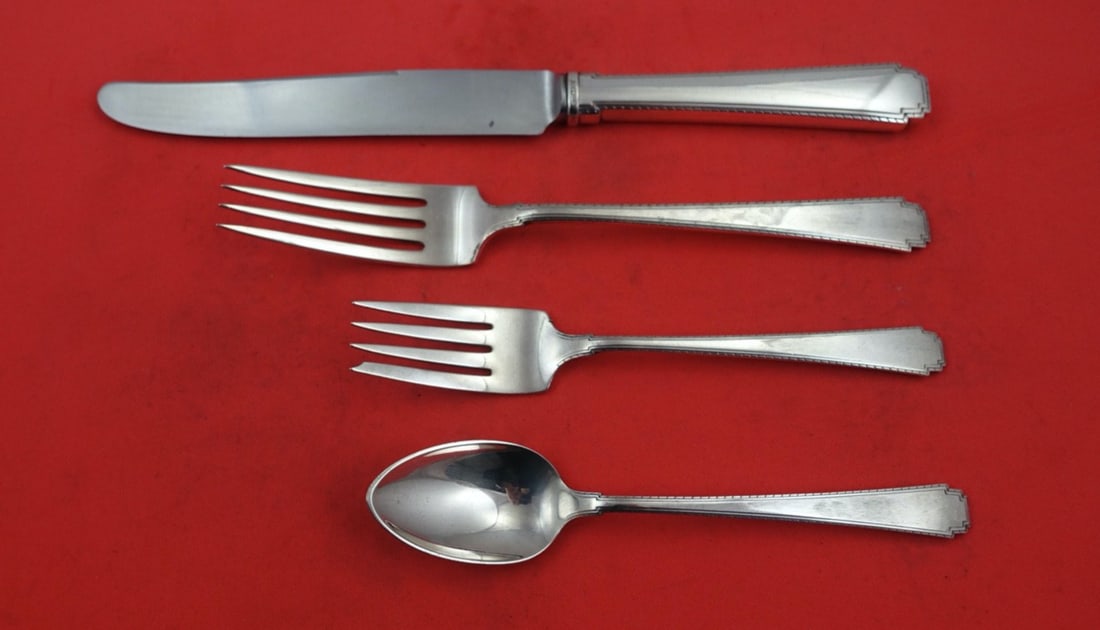 Wallace Rhythm Sterling Silver 4-Piece Dinner Place Setting: Wallace Rhythm Sterling Silver 4-Piece Dinner Place Setting Enhance your dining experience with this exquisite 4-piece place setting from the Rhythm pattern by Wallace. Crafted from high-quality sterl