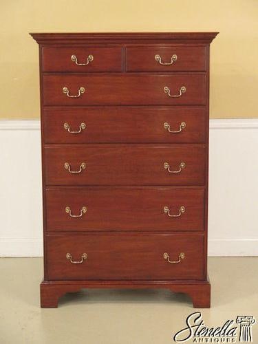 Cherry Wood High Chest Model 134 with Brass Hardware and #24 Finish: Cherry Wood High Chest Model 134 with Brass Hardware and #24 Finish This Henkel Harris Model #134 high chest of drawers features a cherry wood construction with a #24 finish. It is designed with indiv